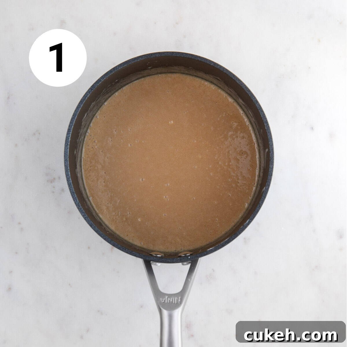 Saucepan with mixed ingredients before cooking.