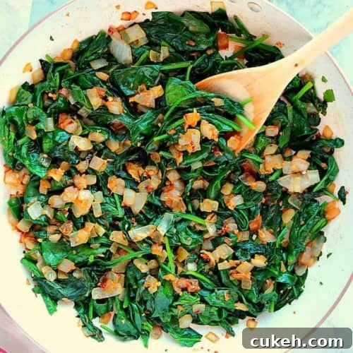 Sauteed spinach in a pan.