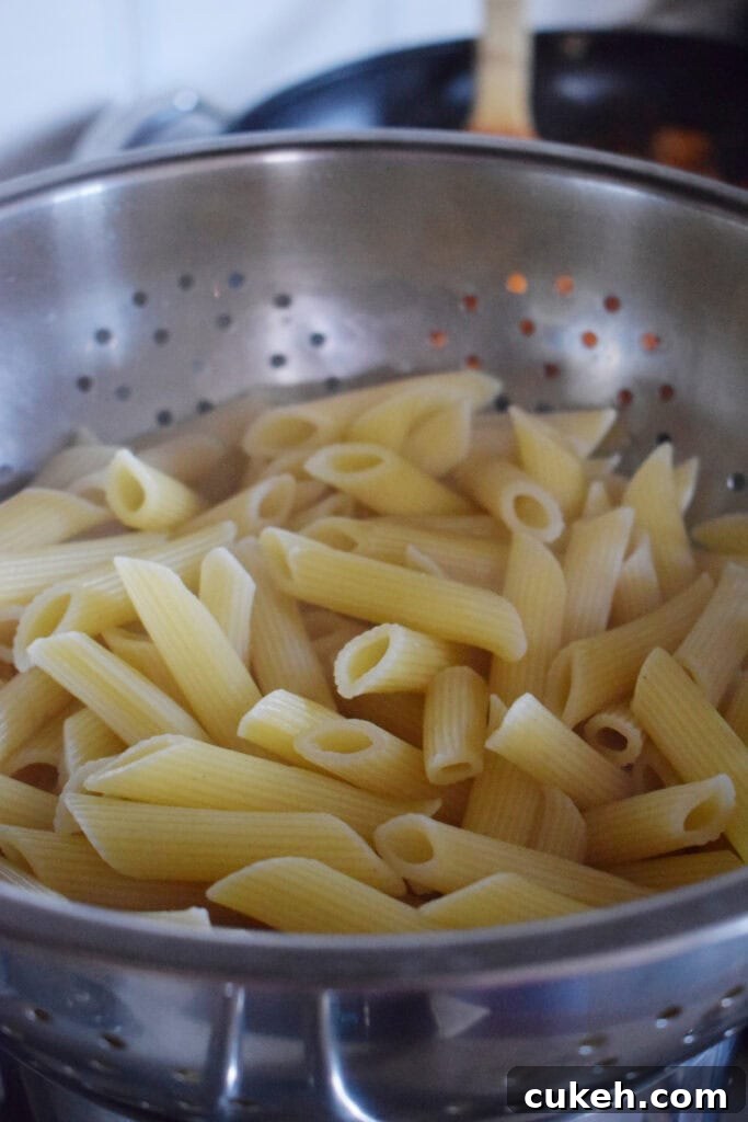 Drained pasta in a colander.