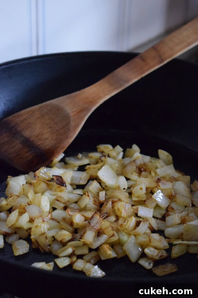 Cooked onions in a skillet.