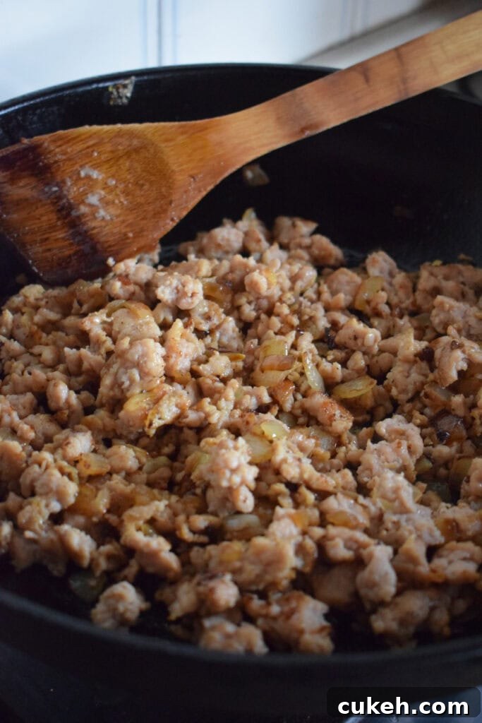 Cooked ground turkey in a skillet.