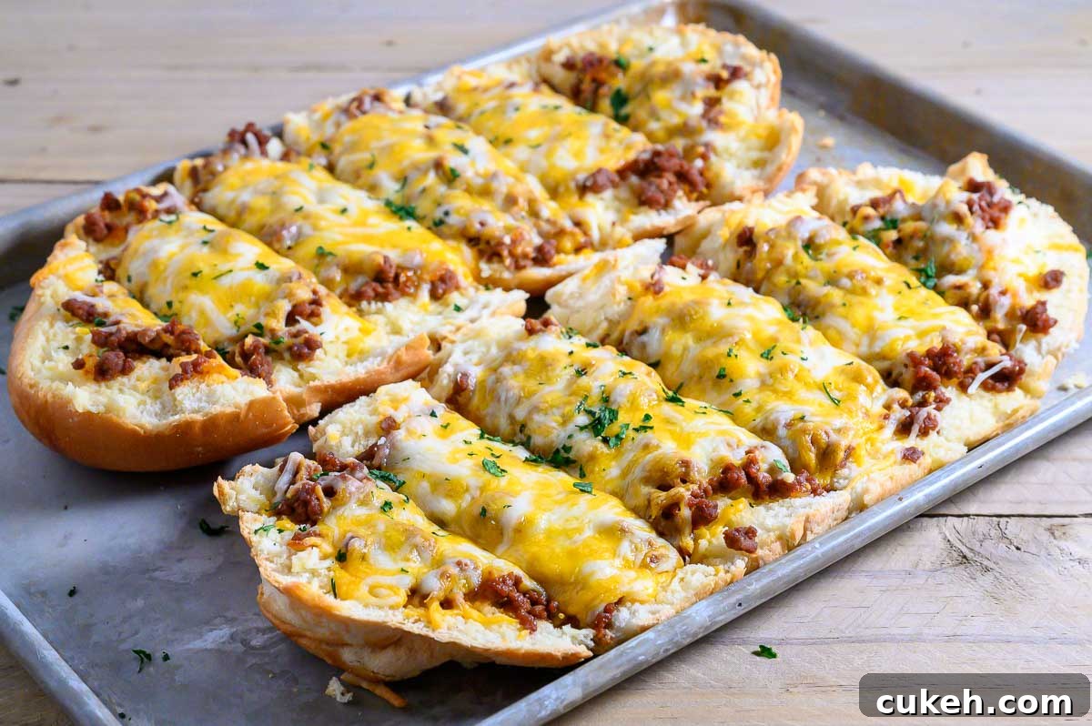 Ground Beef and Garlic Bread Recipe on a cookie sheet.