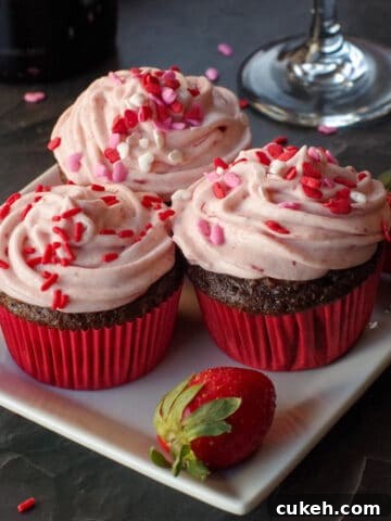 3 red wine cupcakes on a white plate