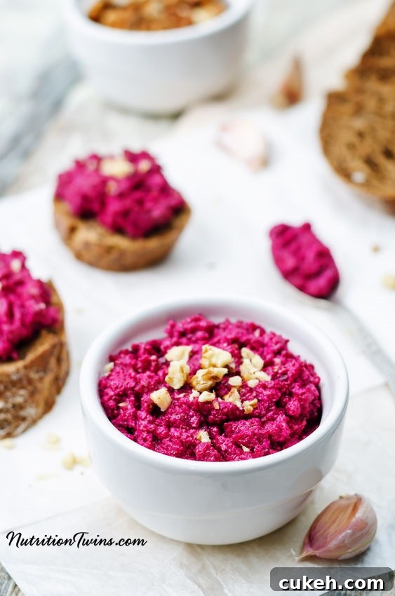 45670499 - beet pesto on a white wood background