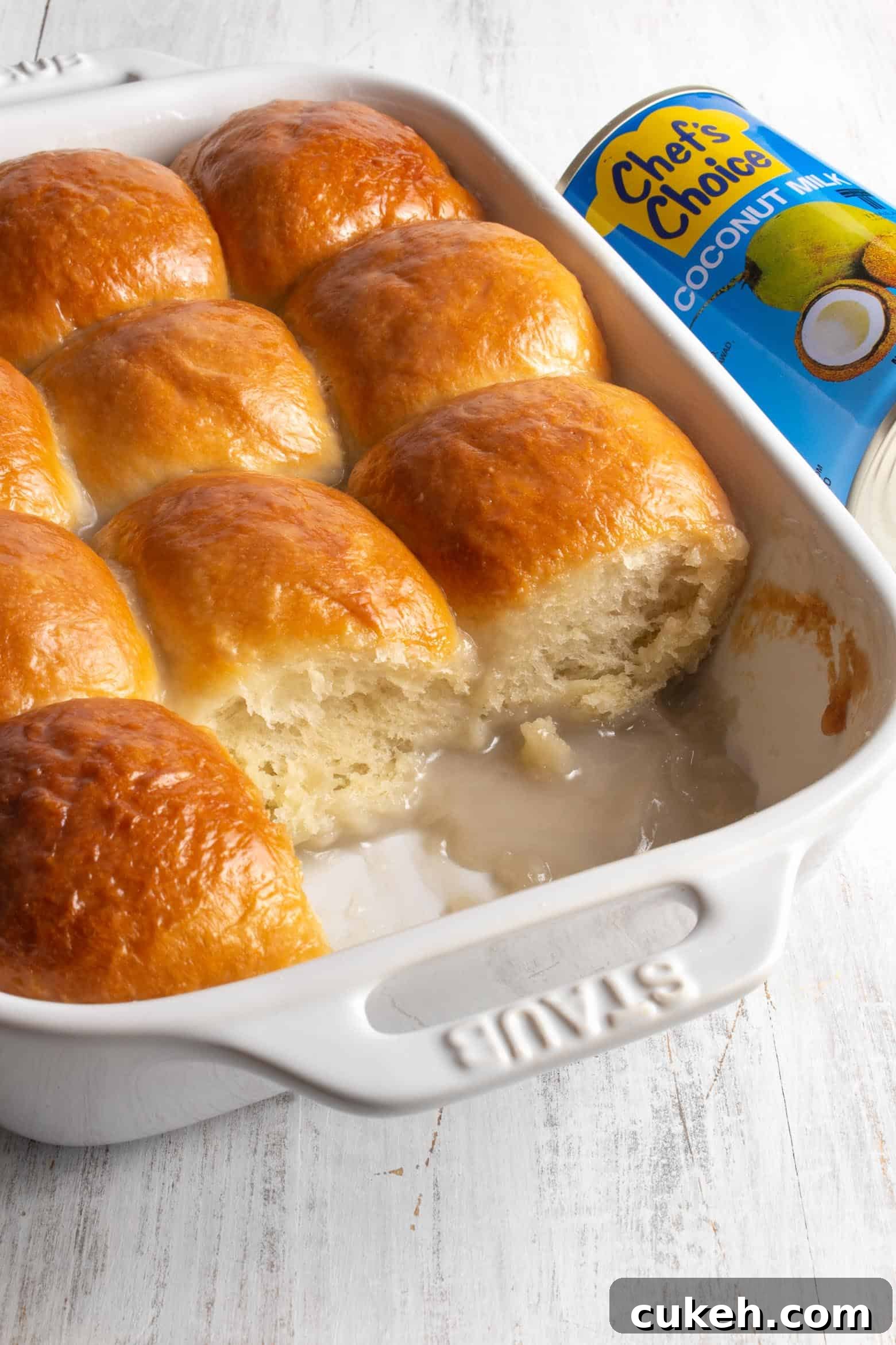 Sweet coconut buns in a baking dish.