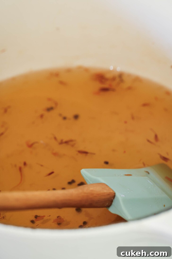 Close up of sugar syrup for Gulab Jamun.