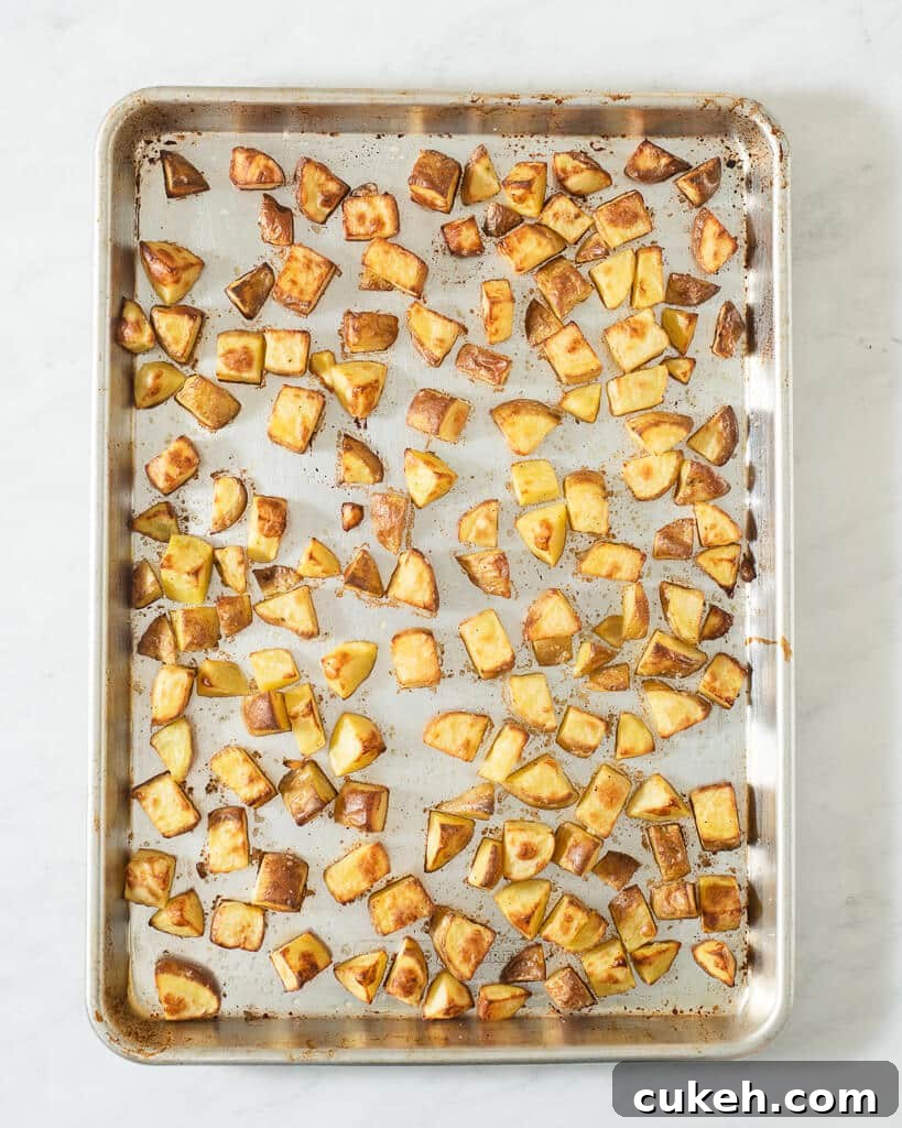 a sheet pan of cubed roasted potatoes
