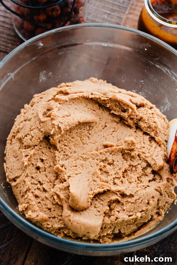 A bowl of pumpkin cookie dough.
