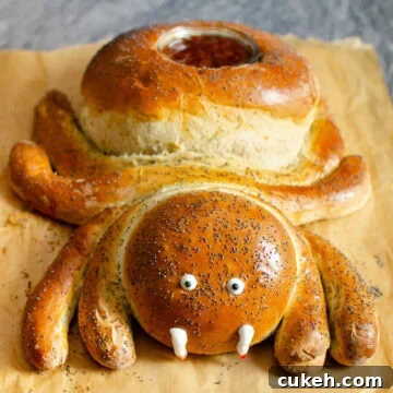Halloween Spider Bread on a wooden chopping board