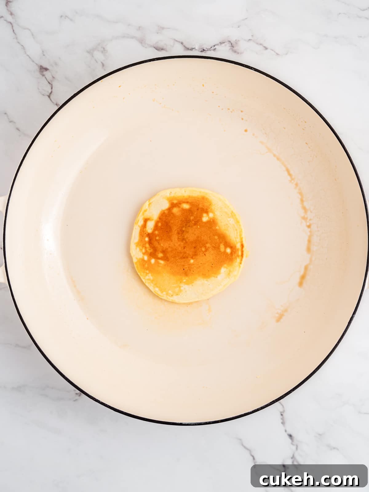 cook circular pancakes in a skillet