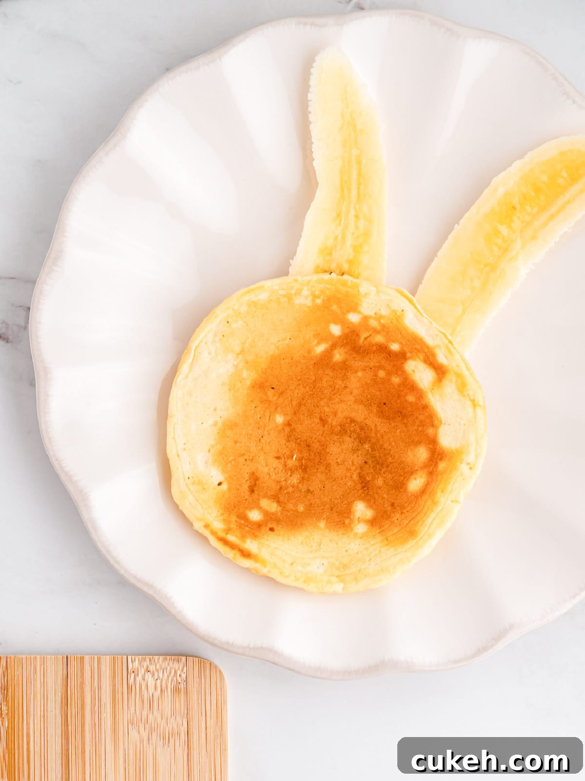 layer pancake over banana bunny ears