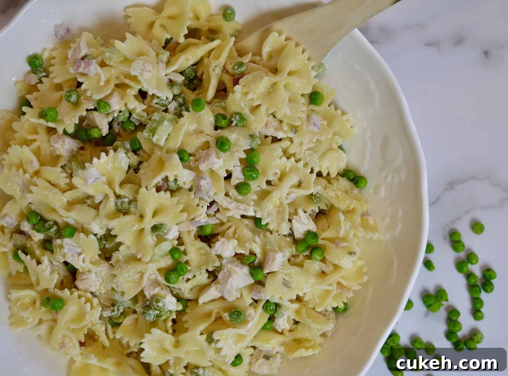 Rotisserie Chicken Pasta salad in a white bowl 