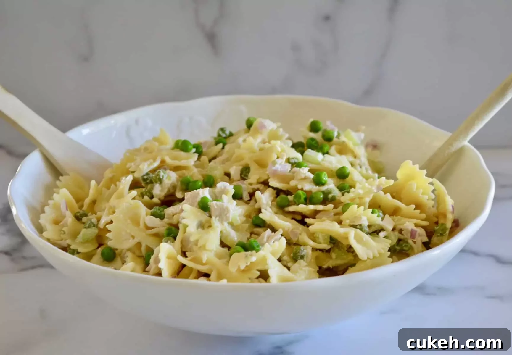 pasta salad in a white bowl