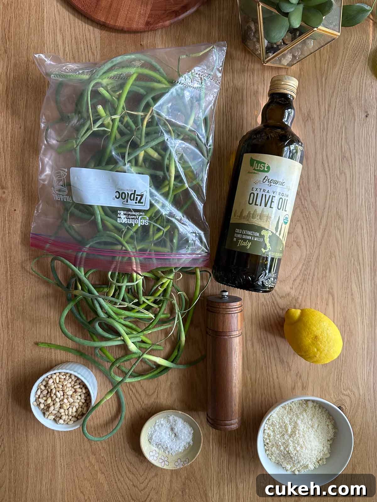 ingredients for garlic scape pesto on a table