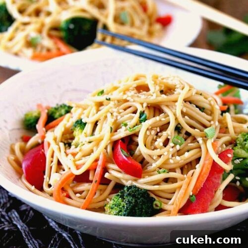 Asian noodles in a white bowl.