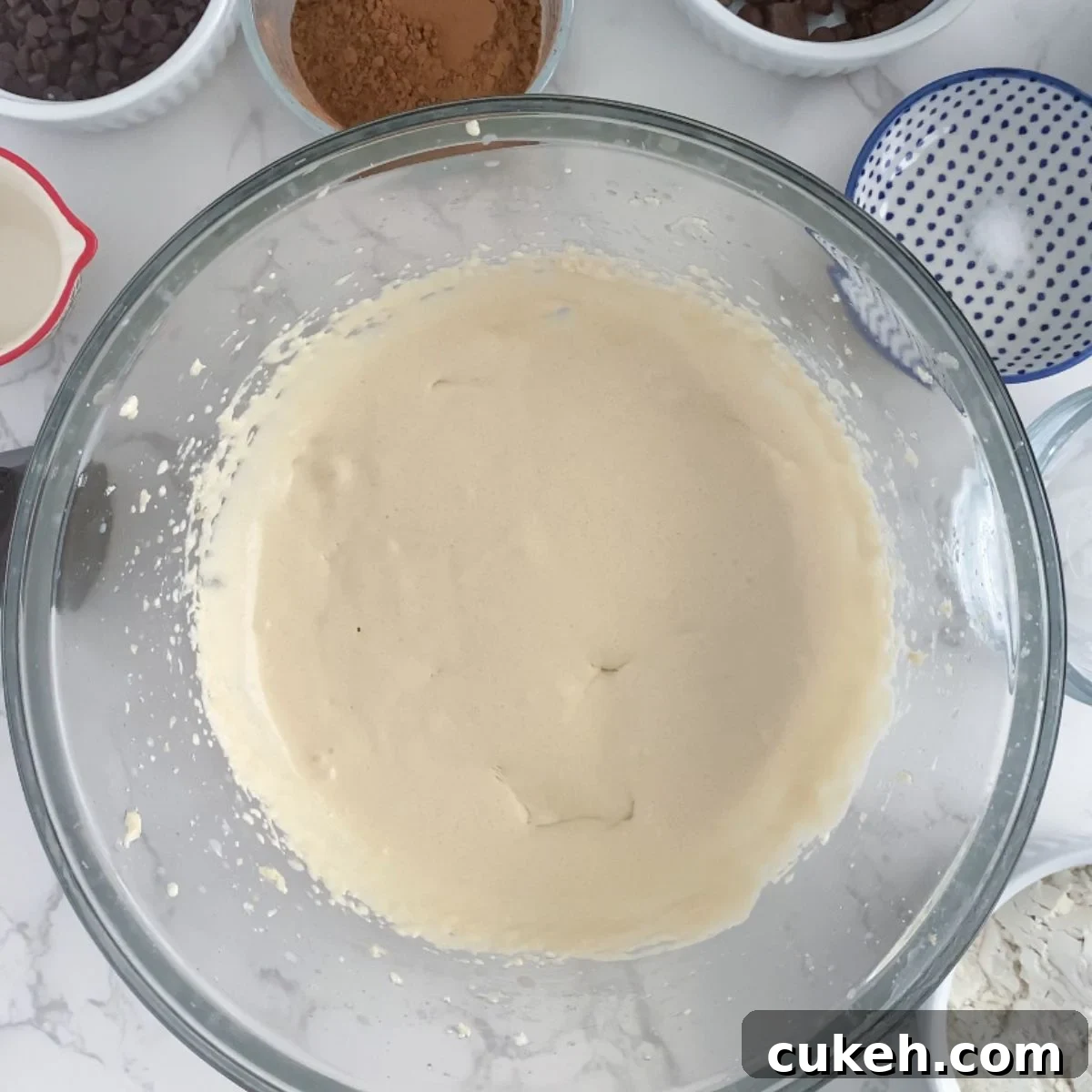 How to Make Safe Edible Brownie Batter at Home 5 creamed butter, sugar, milk and vanilla in a bowl.