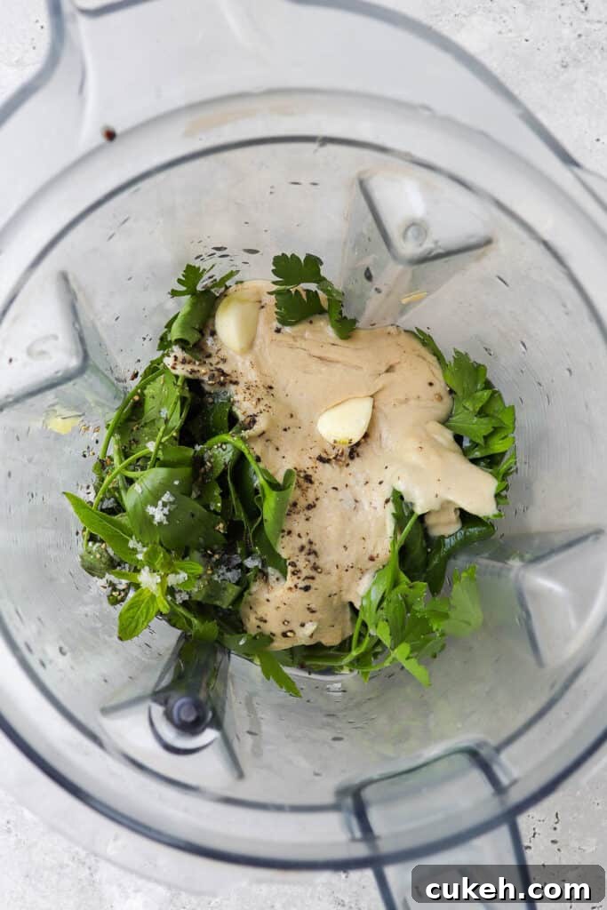 Tahini sauce ingredients in blender.