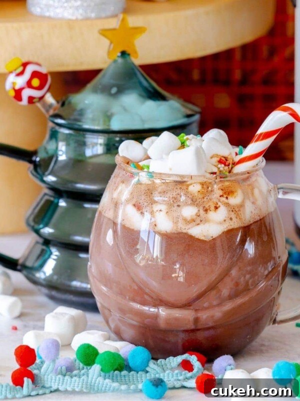 Saint Patrick's Day Hot Chocolate Bombs Recipe: Festive Ideas & Tips 8 mug with hot chocolate with candy cane stirrer and mini marshmallows
