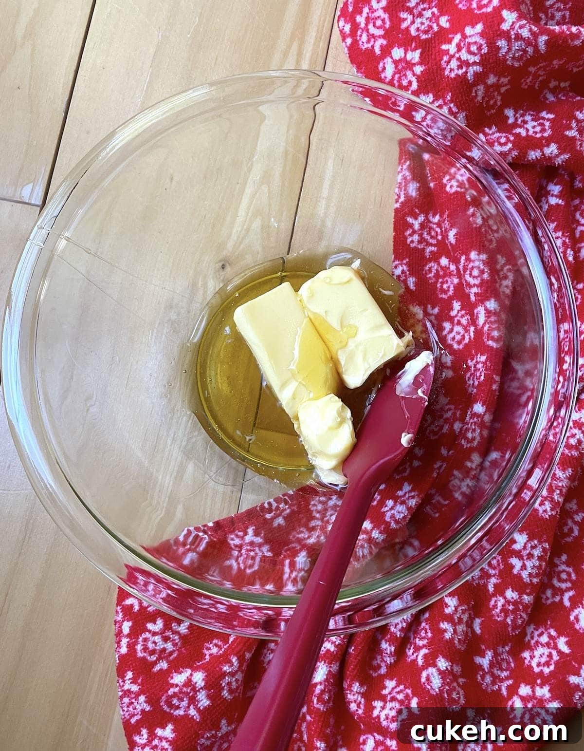 A small bowl of butter and honey, showing how to make honey butter.