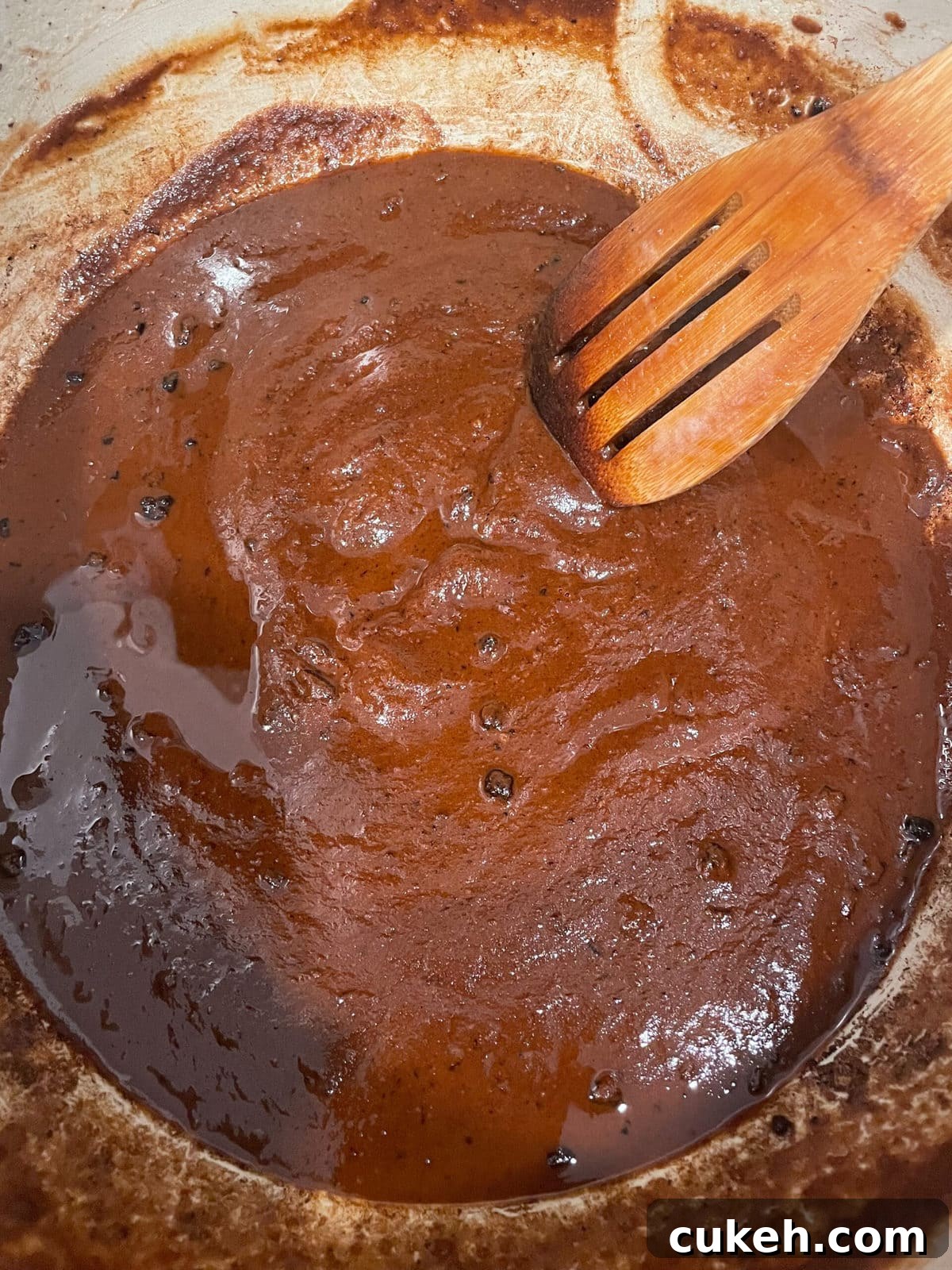 overhead shot of dark brown roux