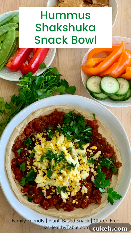Hummus Shakshuka Snack Bowl with Veggies and Sweet Potato Chips via LizsHealthyTable.com #vegetarian