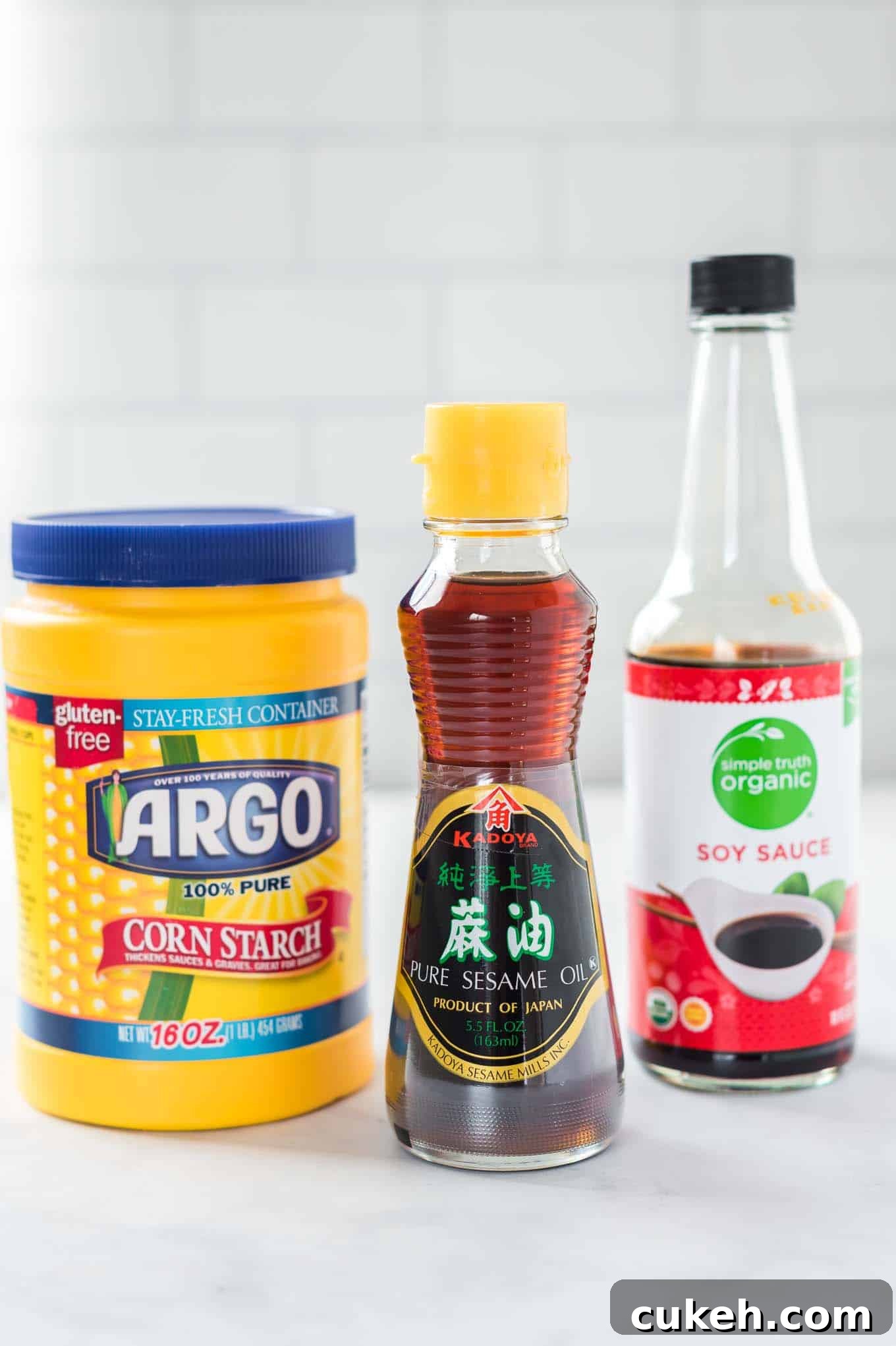jars of sesame oil, soy sauce, and corn starch