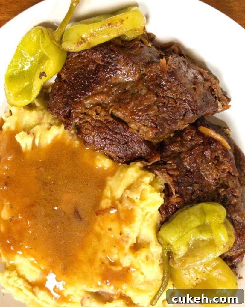 Mississippi pot roast with pepperonis mashed potatoes and gravy.