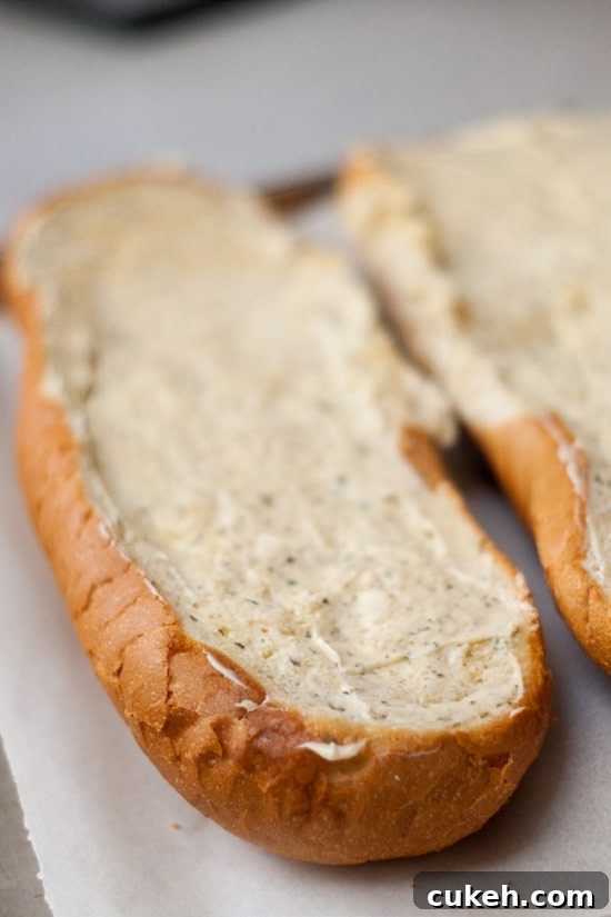 Pre made garlic bread load on white napkins.