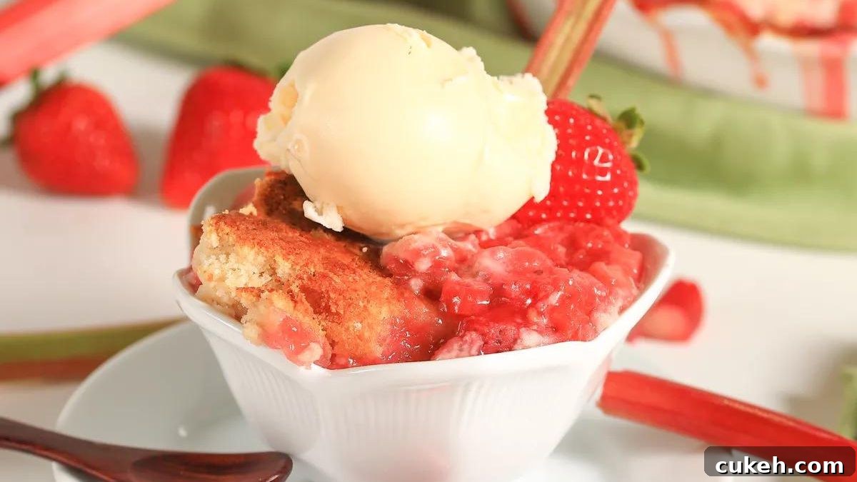 Strawberry rhubarb dump cake in a white dish.