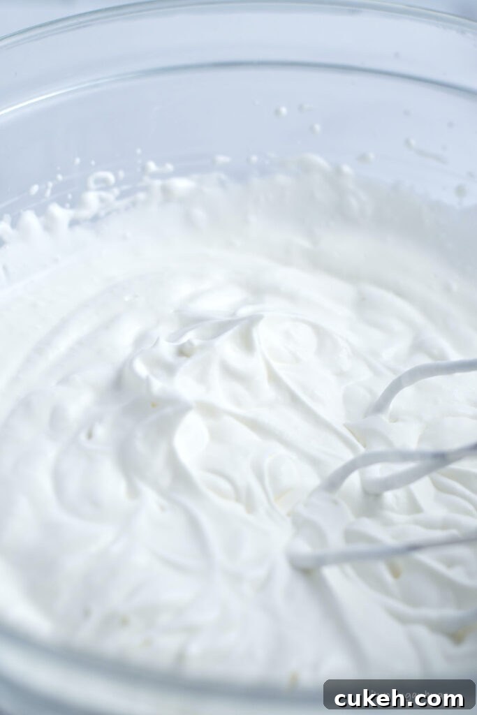 whipped cream at medium peaks