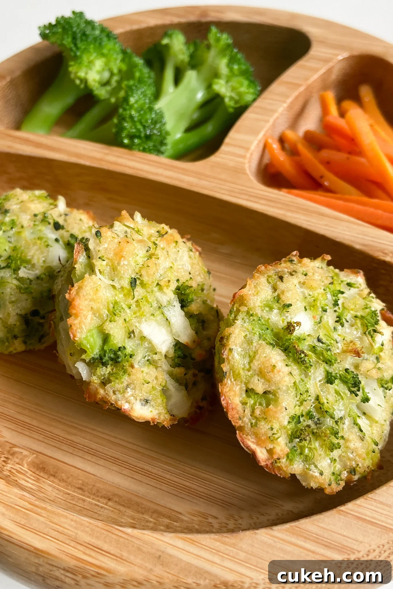 15 Nutritious Broccoli Recipes for Babies and Toddlers 7 Broccoli and cheese bites served with broccoli and sliced carrots