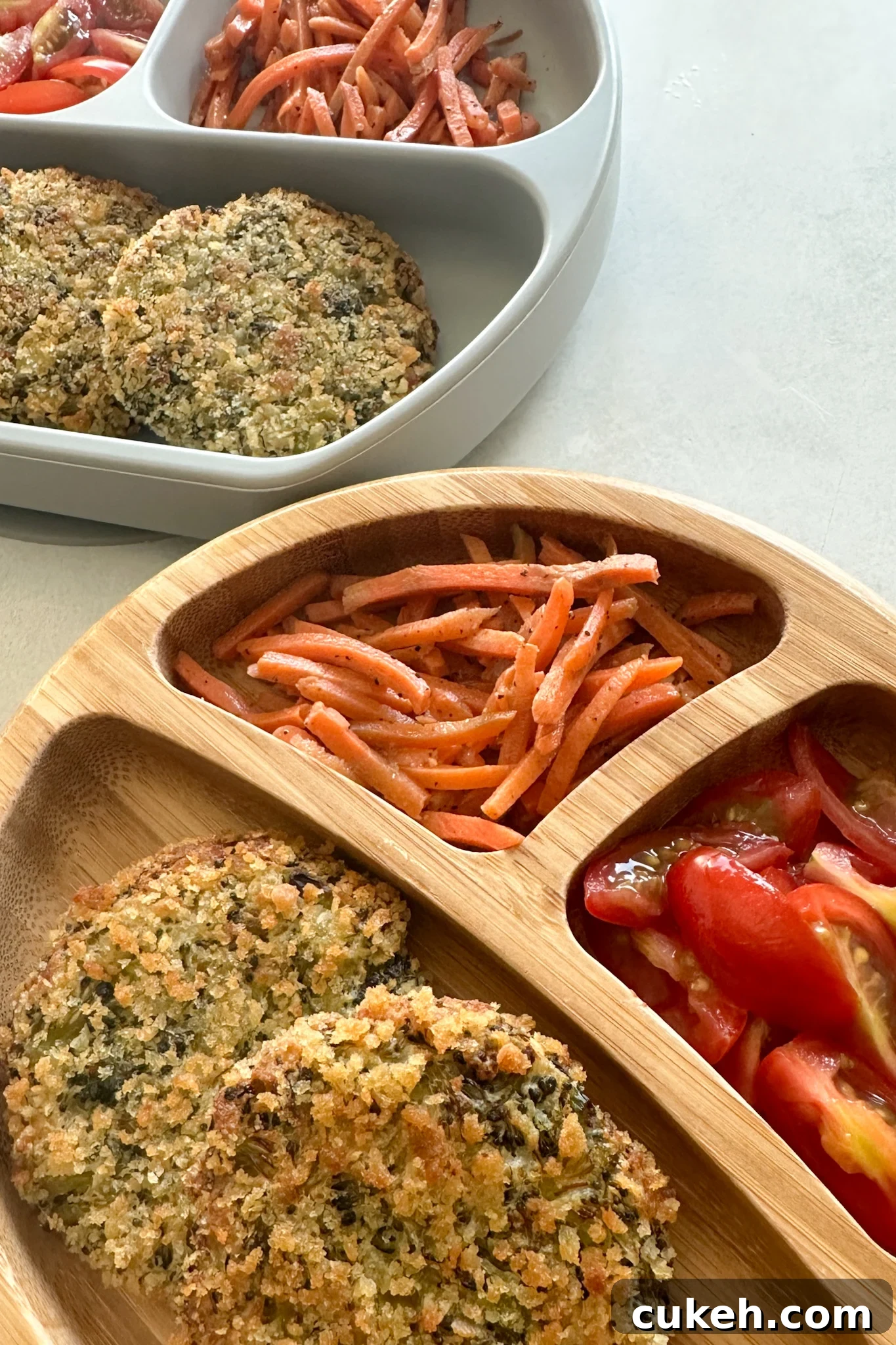 15 Nutritious Broccoli Recipes for Babies and Toddlers 9 Broccoli patties served with carrots and tomatoes.