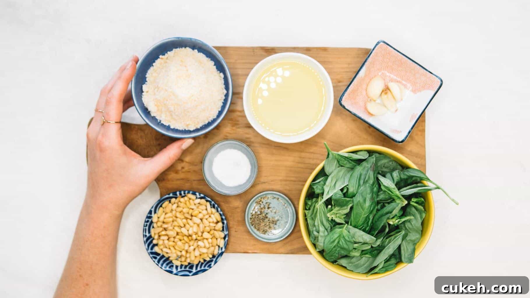 How to make Pesto ingredients in bowls on a wooden board