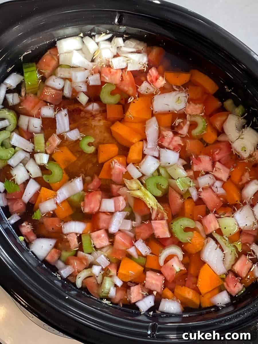 Add 8 cups of water to the slow cooker with the rest of the ingredients.