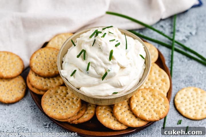 Garlic dip topped with chopped chives.