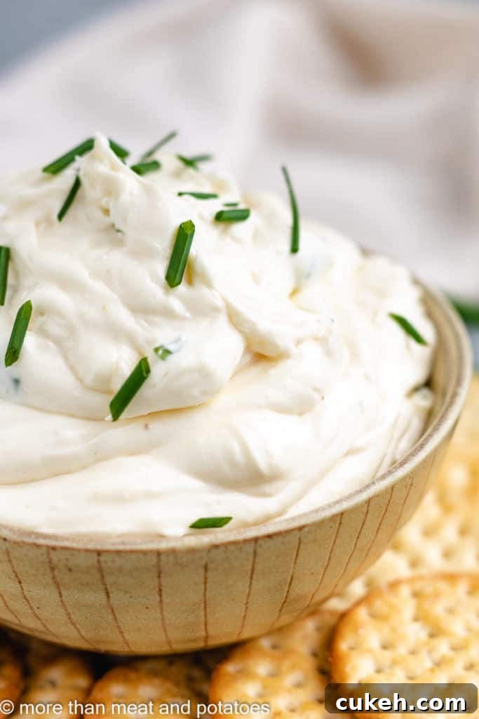 Garlic dip in a yellow bowl.