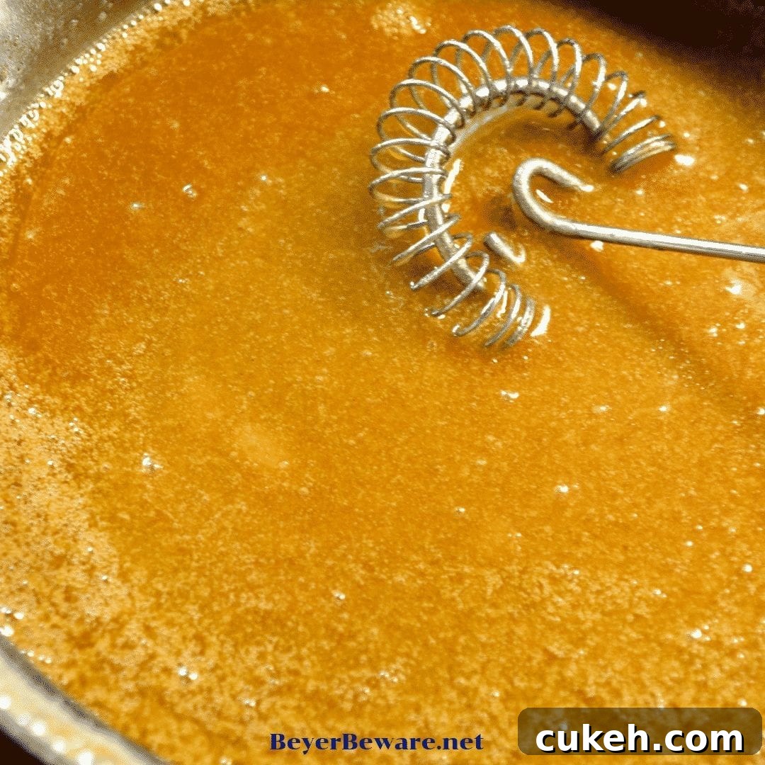 Make the caramel sauce by boiling butter and brown sugar.