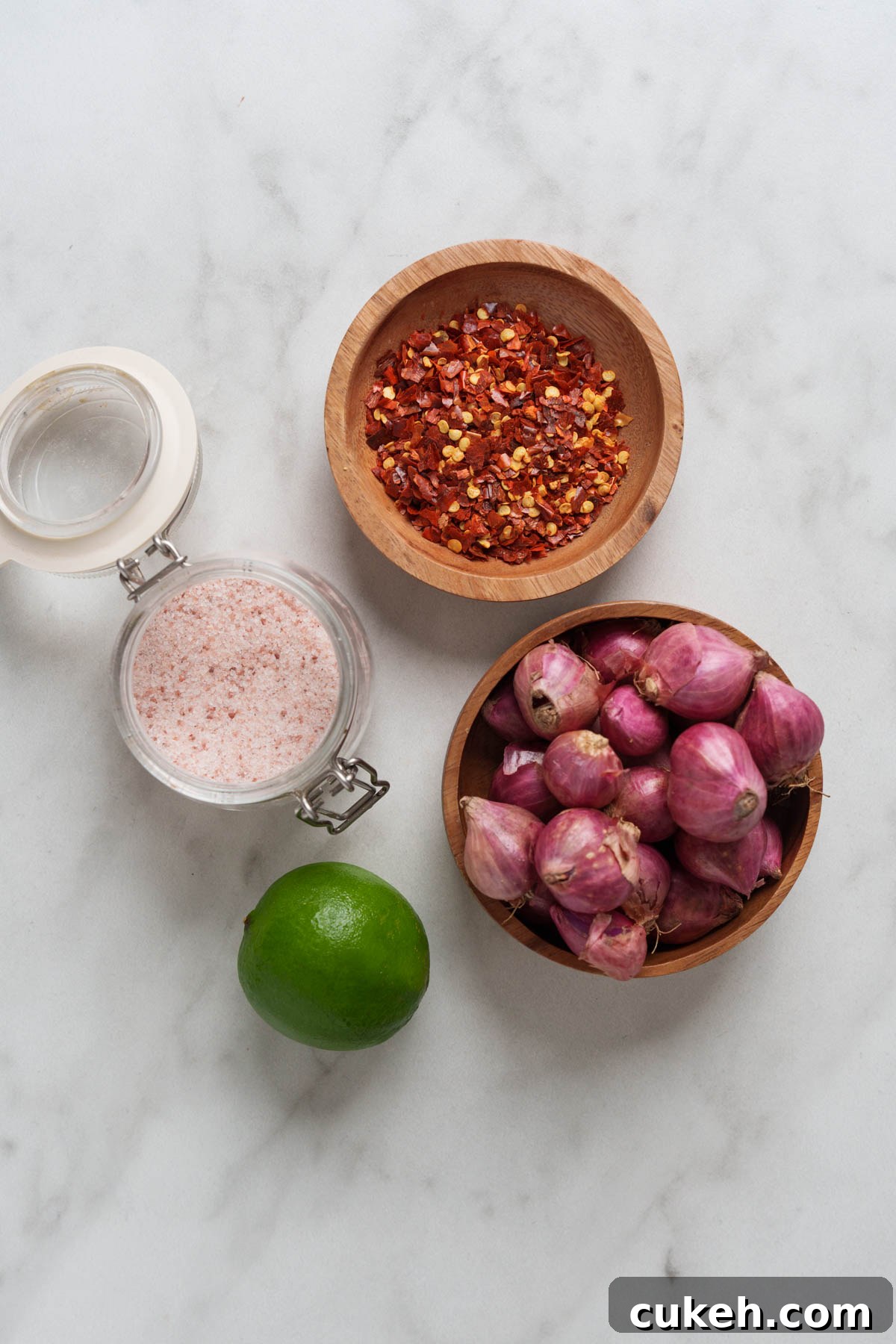 ingredients for lunu miris on a white background.