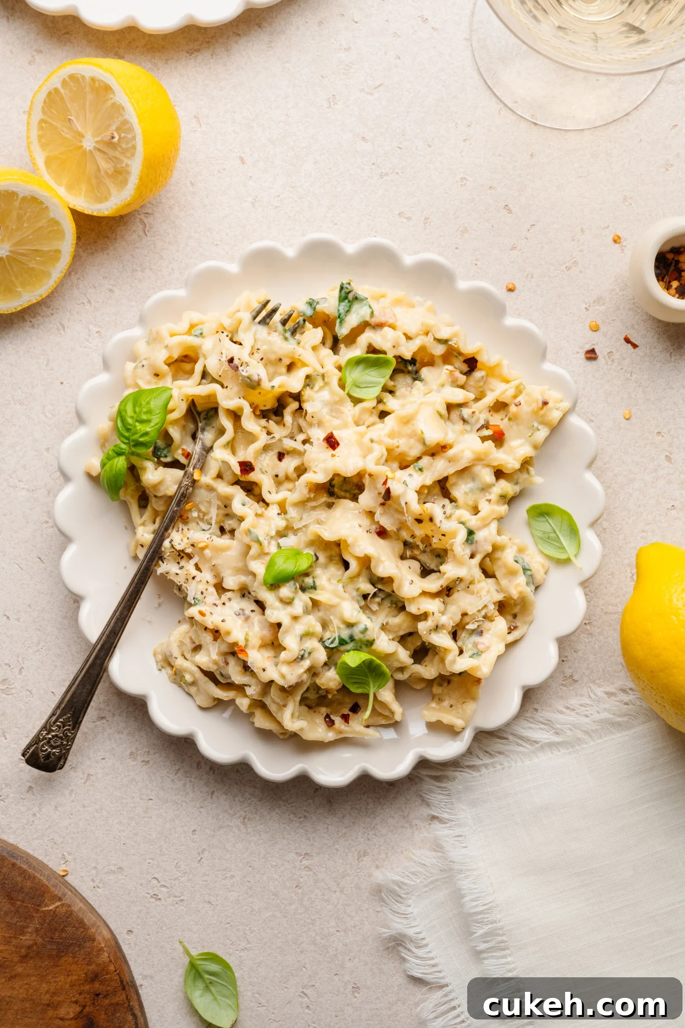 Zucchini lemon pasta garnished with basil