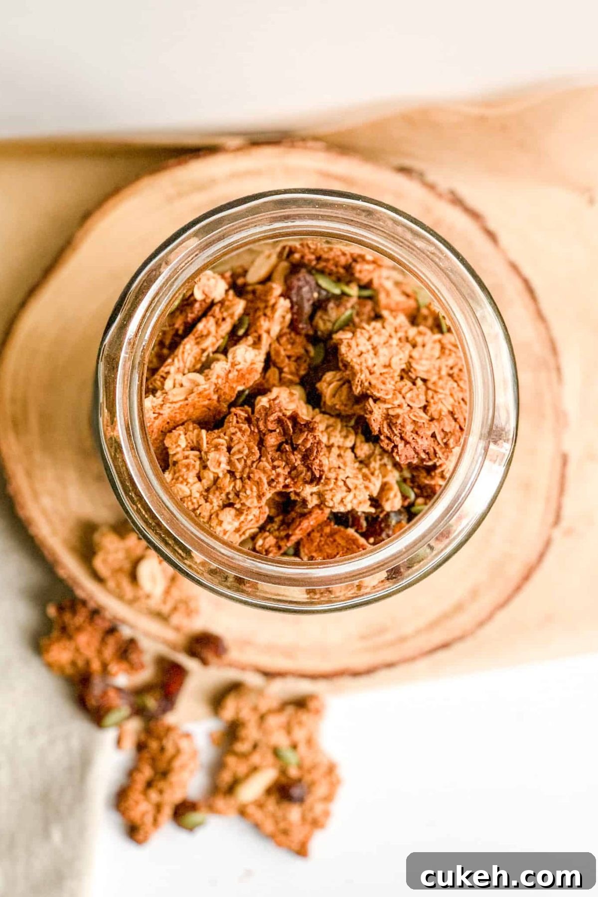 Food Photography Glass Jar of Healthy Crunchy Homemade Granola for Breakfast for Food Blog