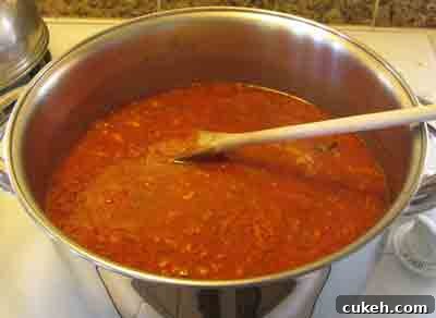 Add water if necessary to cover the beef for moschari-me-agkinares