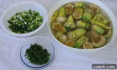 Artichokes, scallions and dill for beef wth artichokes moschari-me-agkinares