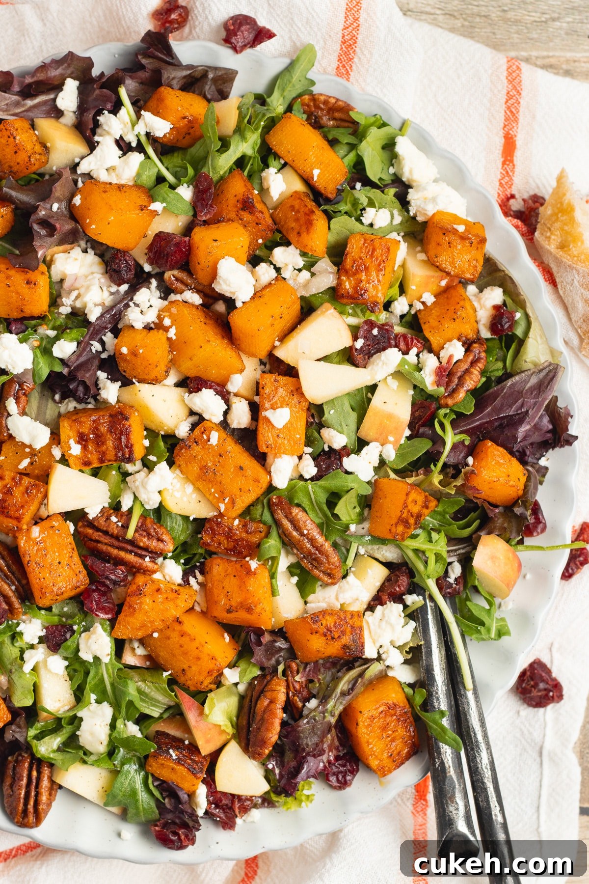 This is a picture of a plate of butternut squash feta salad.