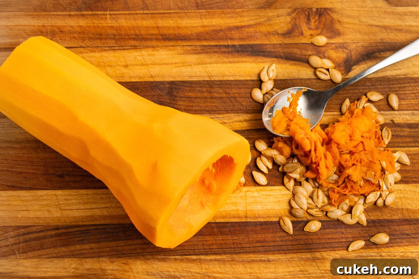 This is a picture of a squash with seeds scooped out.