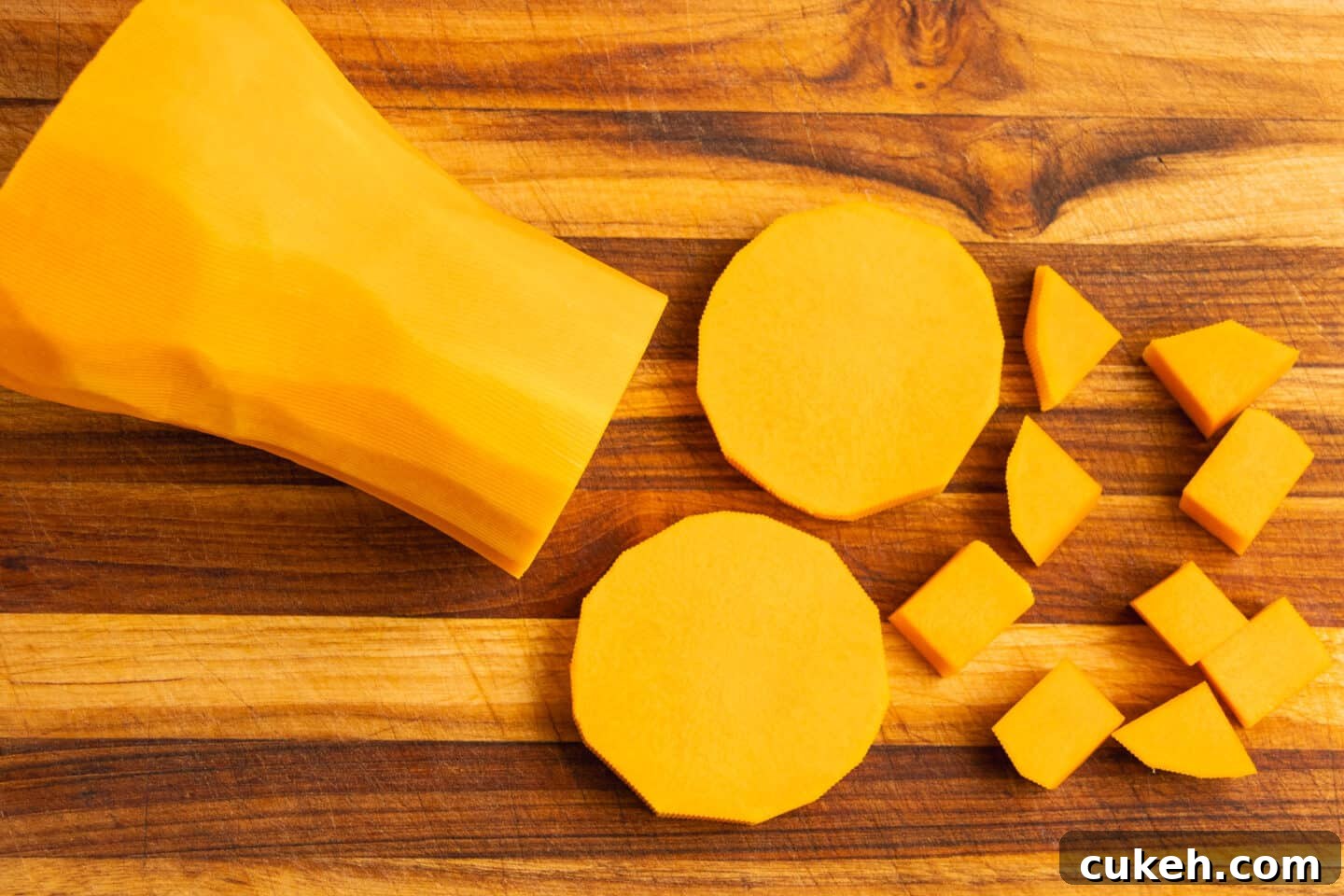 This is a picture of a butternut squash getting chopped up.