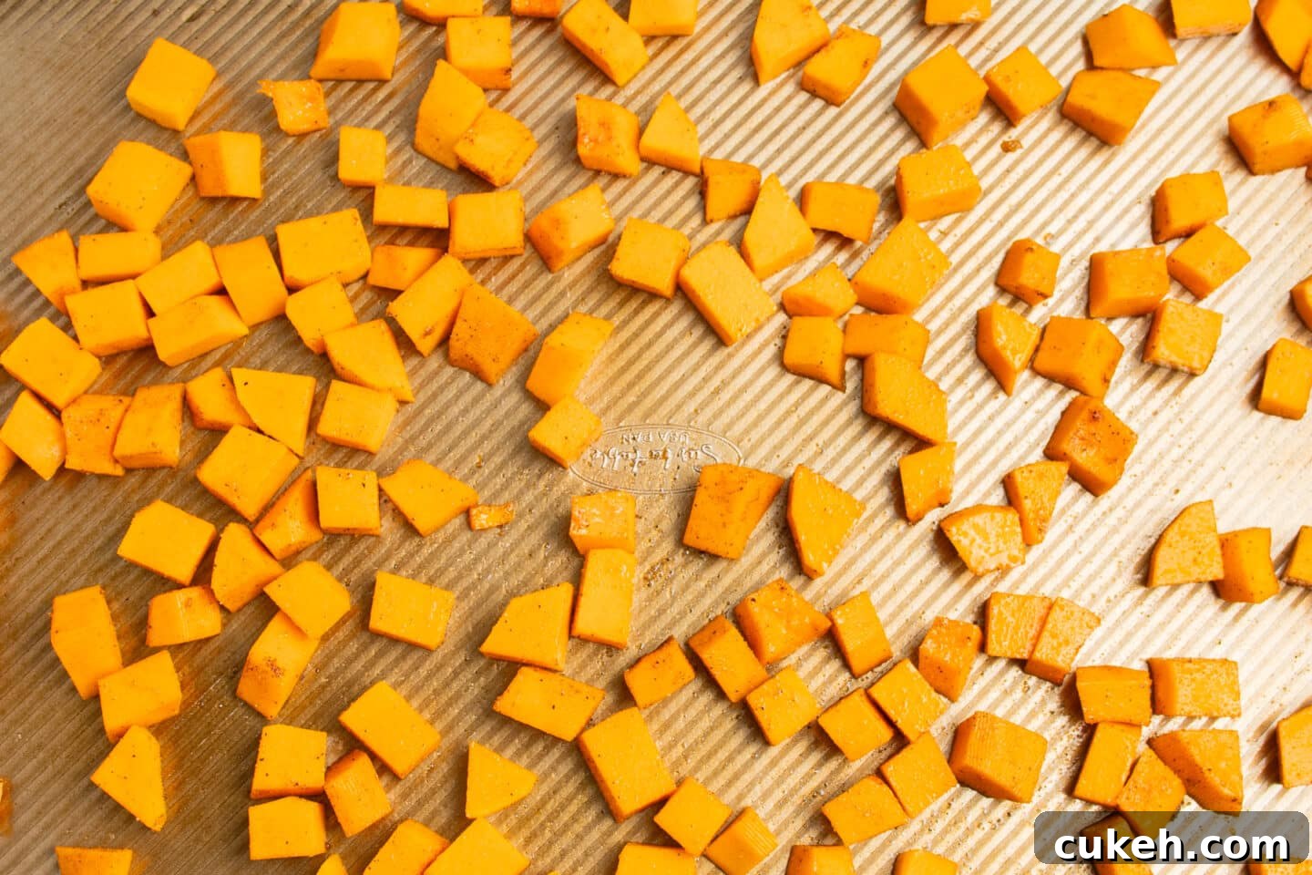 This is a picture of butternut squash ready to get roasted.