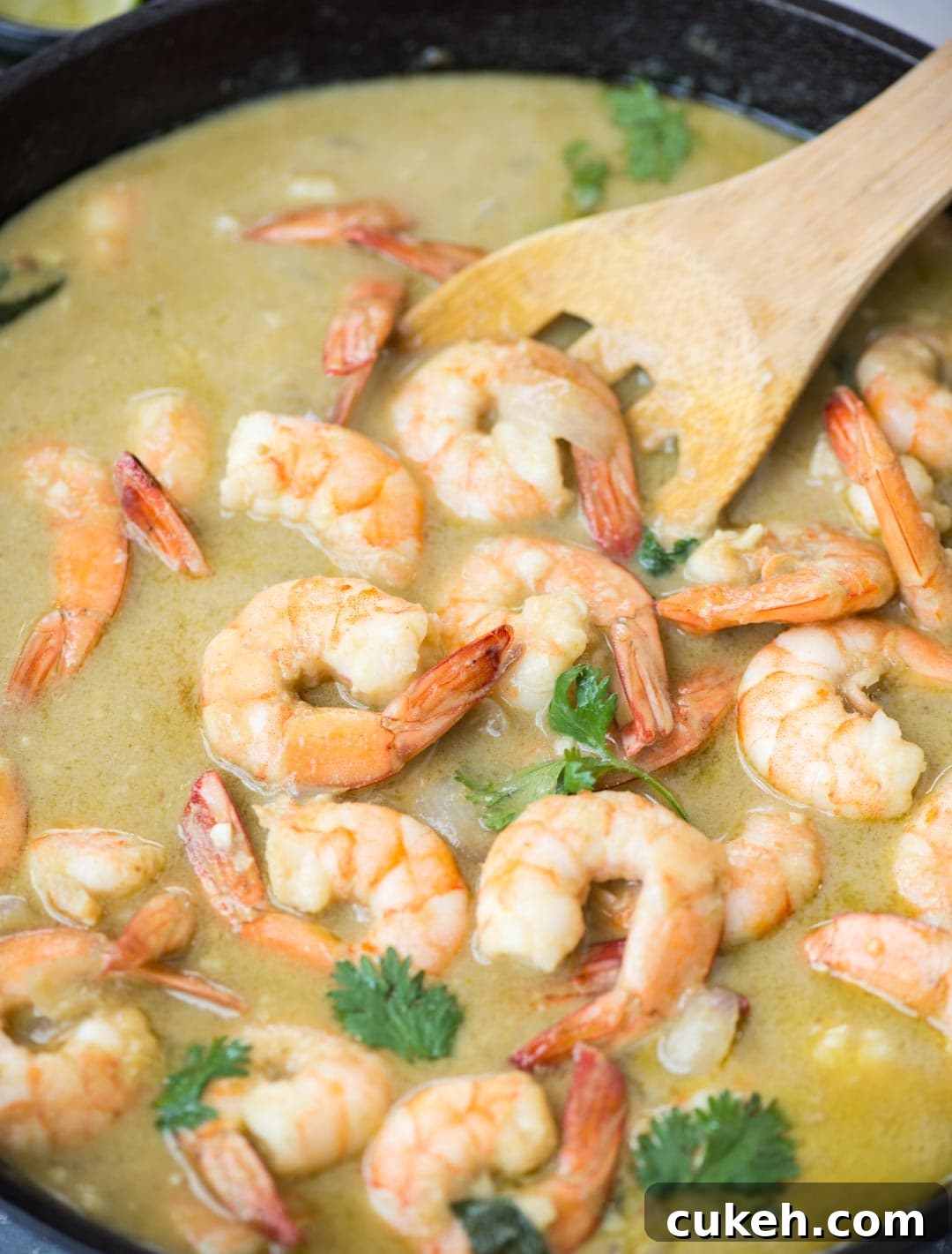 Delicious Shrimp Curry simmered in Thai green curry paste and creamy coconut milk takes less than 20 minutes to make.