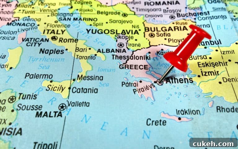 red pin marks Athens on map of Greece