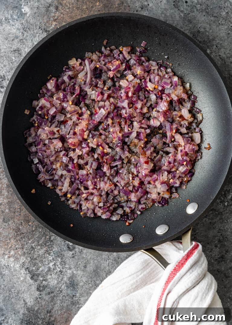 overhead: sautéing onion and garlic