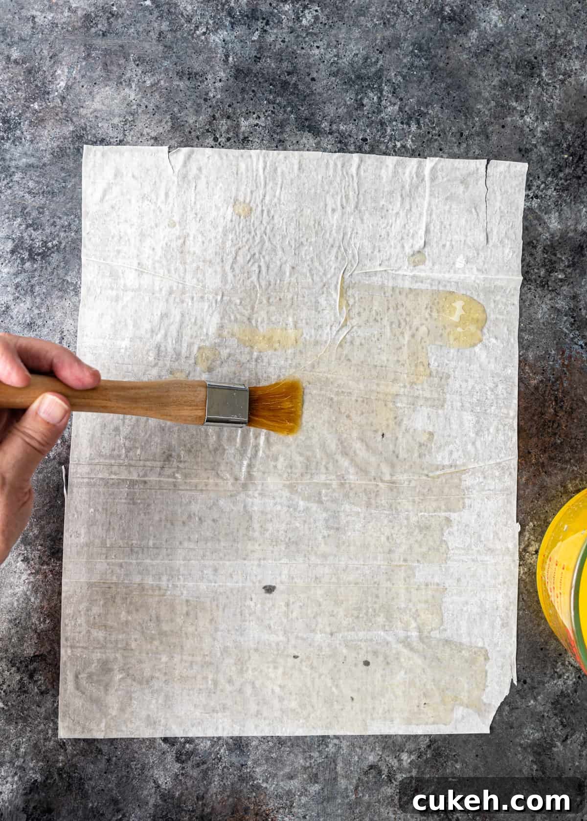 brushing butter on filo sheet